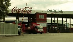 Confirman contagios en empresa vial y fabricante de Coca Cola