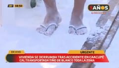 Camión que transportaba cal vuelca en el Cerro Caacupé y genera daños en vivienda