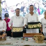 Peña hace chipa con alusión a Olimpia en feria del MAG